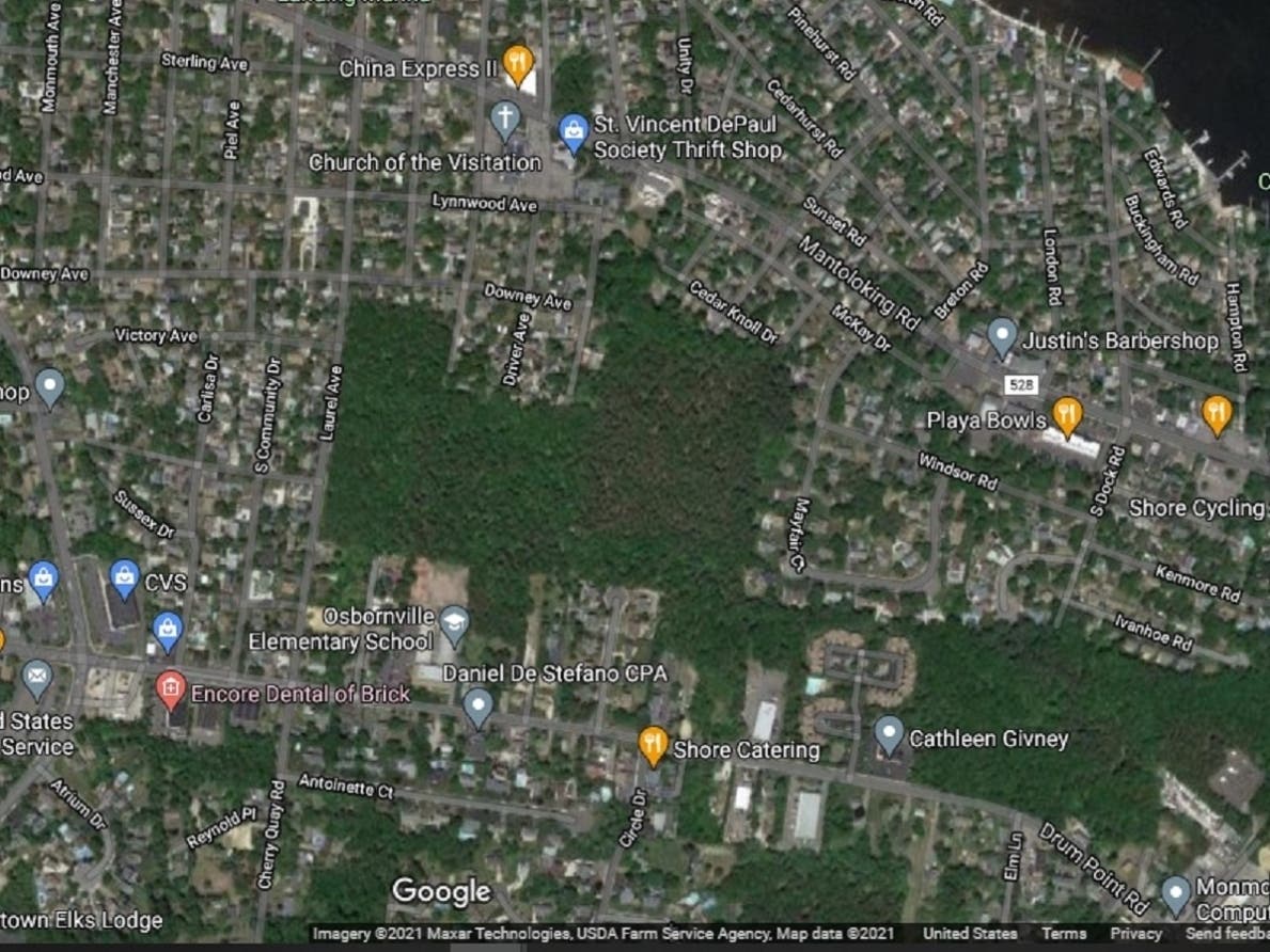 Residents of Breton Woods want to protect the 30-acre patch of trees and wildlife in the middle of this Google Maps image. Church of the Visitation, which owns the parcel, is in talk to sell it to a developer.  