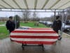 Edwin Basterl's coffin is draped with the flag before the burial service at  Brig. General William C. Doyle New Jersey Veterans Memorial Cemetery in Wrightstown.