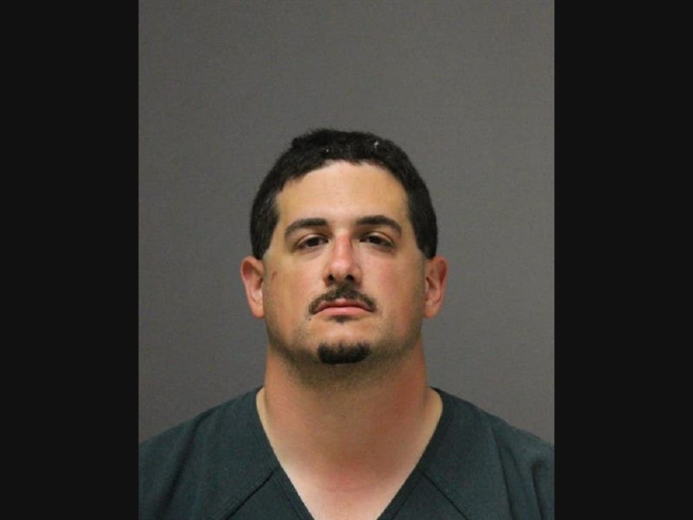 Michael Tsamas, 35, of Laurence Harbor, is accused of stabbing Joseph Delgardio of Jackson in the neck after Delgardio confronted him in the street, officials said.