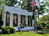 Wreaths sit in front of the Grand Army Memorial in Manchester.