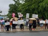 Protesters along Water Street on Monday. 
