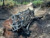 A Polaris ATV was destroyed when it flipped and caught fire. The two women riding it are being treated at a burn center, police said. 