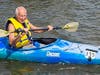 A participant checks in at the initial checkpoint for the Paddle on the Bay world-record kayak and canoe parade attempt.