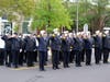 Toms River firefighters salute during the Sept. 11 commemoration service on Sunday. 