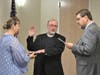 Rev. Dr. Francis Watson is sworn in as the Manchester Police Department's police chaplain.