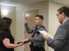 Patrolman Sean Rembach takes the oath. 