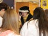 Toms River Intermediate East teacher Casey Kanarkowski talks with some of his students, noting it took four voyages for Columbus to reach the West Indies. 