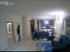 Another still image from a Ring video surveillance camera in one home shows all three burglars in the kitchen/dining area from the opposite side of the room in one of two homes burglarized on Tuesday. 
