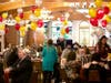The social hall was decorated with red, gold and silver balloons at Congregation B'nai Israel's 72nd anniversary celebration.
