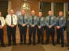 Police Chief James Riccio (left) and Mayor John G. Ducey flank the officers who were promoted: Deputy Chief Steve Gerling, Capt. Terrence Covert, Lt. Josh Jenssen, and Sgts. Marc Alexander, Jeffrey Person and Michael Bennett.
