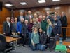 Save Breton Woods residents pose with the Ocean County Board of Commissioners, Ocean County Natural Lands Trust representatives and Brick Planner Tara Paxton after the board's vote Wednesday. 