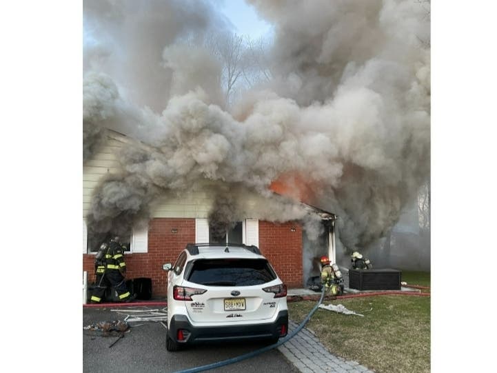 The fire at the Cedar Glen West home started in a garbage can, the prosecutor's office.