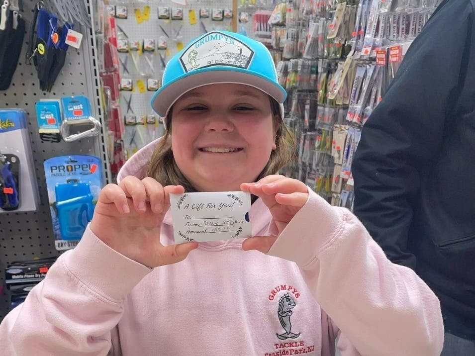 Emma Dluhos, 10, of Brick, loves to fish and spends a lot of time at Grumpy's Tackle in Seaside Park with her dad. When David McCallum donated a $100 gift card, the shop's crew knew she was the perfect recipient. 