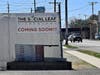 A "Coming Soon" sign hangs on the fence at the property where The Social Leaf retail cannabis dispensary will be opening in South Toms River. 