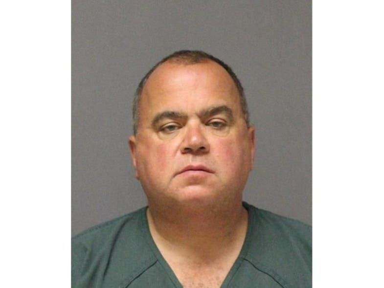 John L. Kisch, 57, is accused of having 100 photos of child pornography on his computer, Ocean County Prosecutor Bradley Billhimer said. 