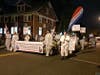 Save Barnegat Bay volunteers march in the Toms River Halloween Parade Tuesday, announcing a "Pep Rally for the River" as the group fights the NJDEP's Ciba-Geigy settlement with BASF. 