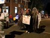 Save Barnegat Bay volunteers, including one warning of the wrath of the Jersey Devil, march in the Toms River Halloween Parade Tuesday, announcing a "Pep Rally for the River" as the group fights the NJDEP's Ciba-Geigy settlement with BASF. 