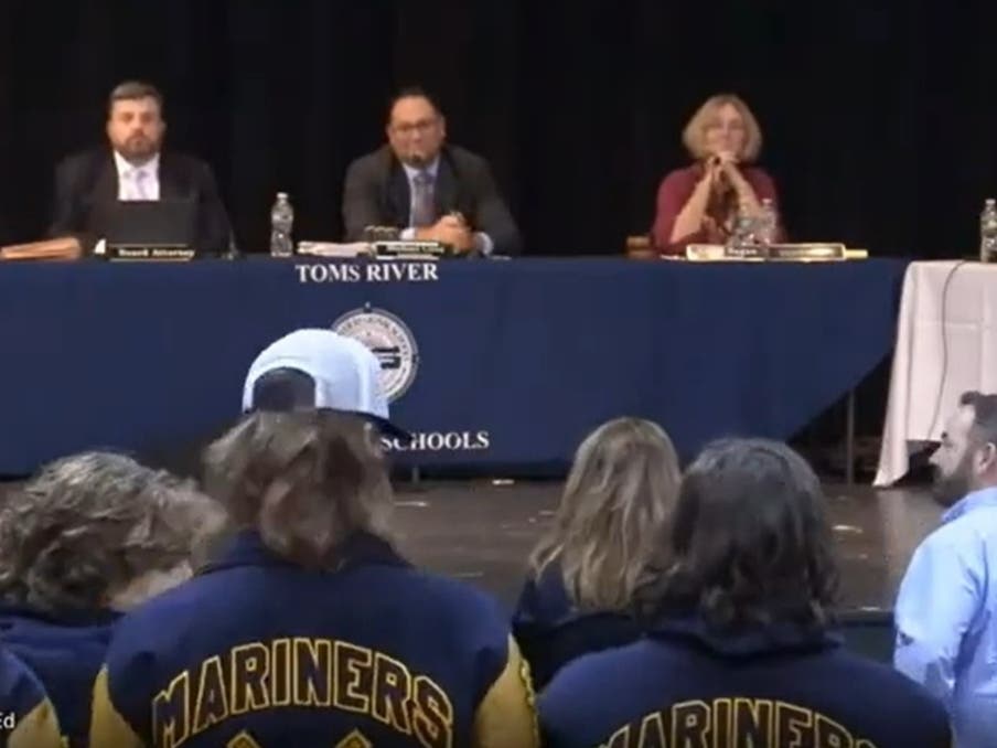 Toms River North ice hockey players stand at the Toms River Regional Board of Education meeting on Tuesday to show how their roster needs help from a possible co-op arrangement with Jackson. 