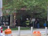 Firefighters and Ocean County sheriff's officers confer outside the Ocean County Courthouse on Hooper Avenue Monday morning. 