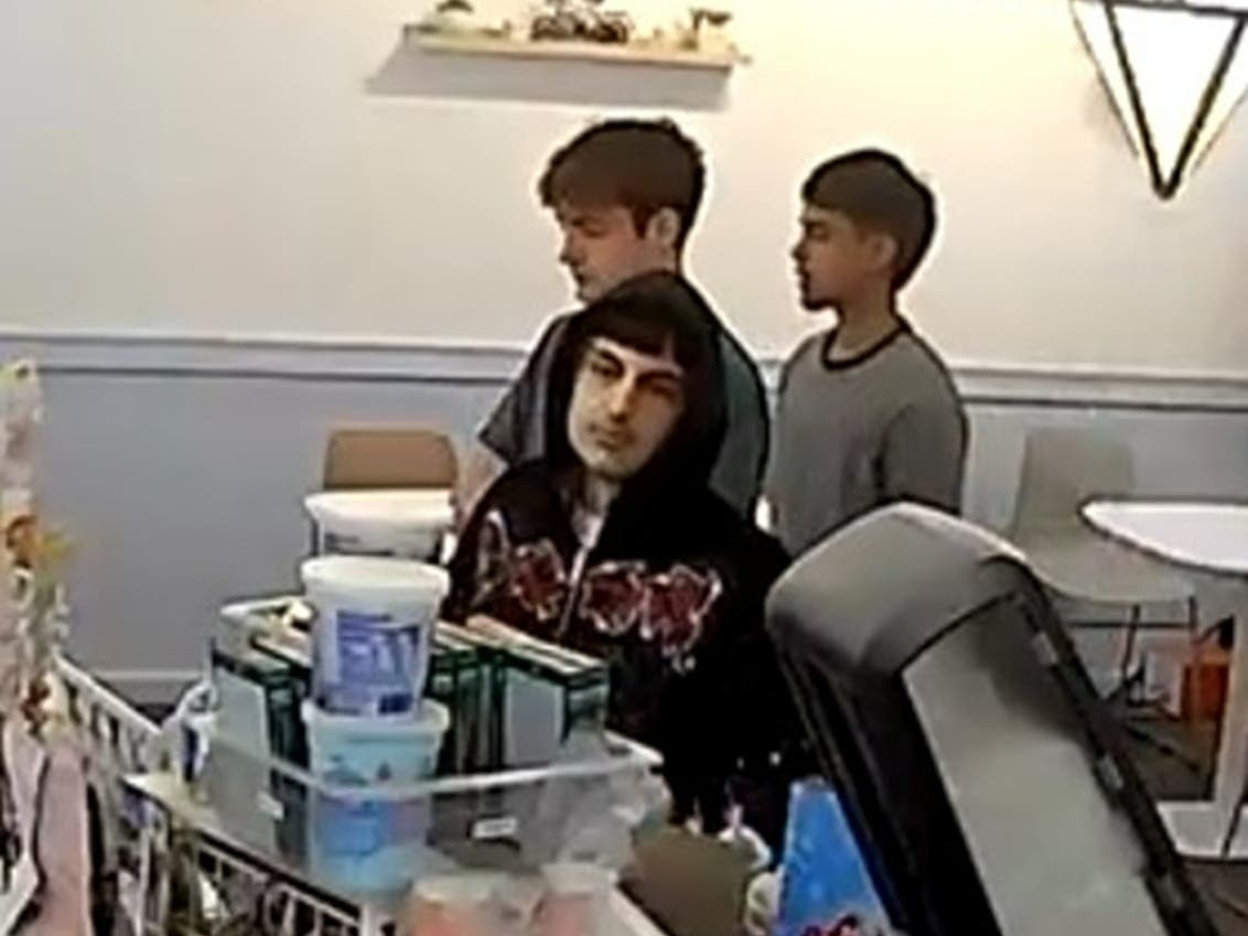 The man in the black hoodie, seen here in a surveillance photo from Menlo Park Mall, is being sought in a debit card fraud case in Toms River, authorities said.