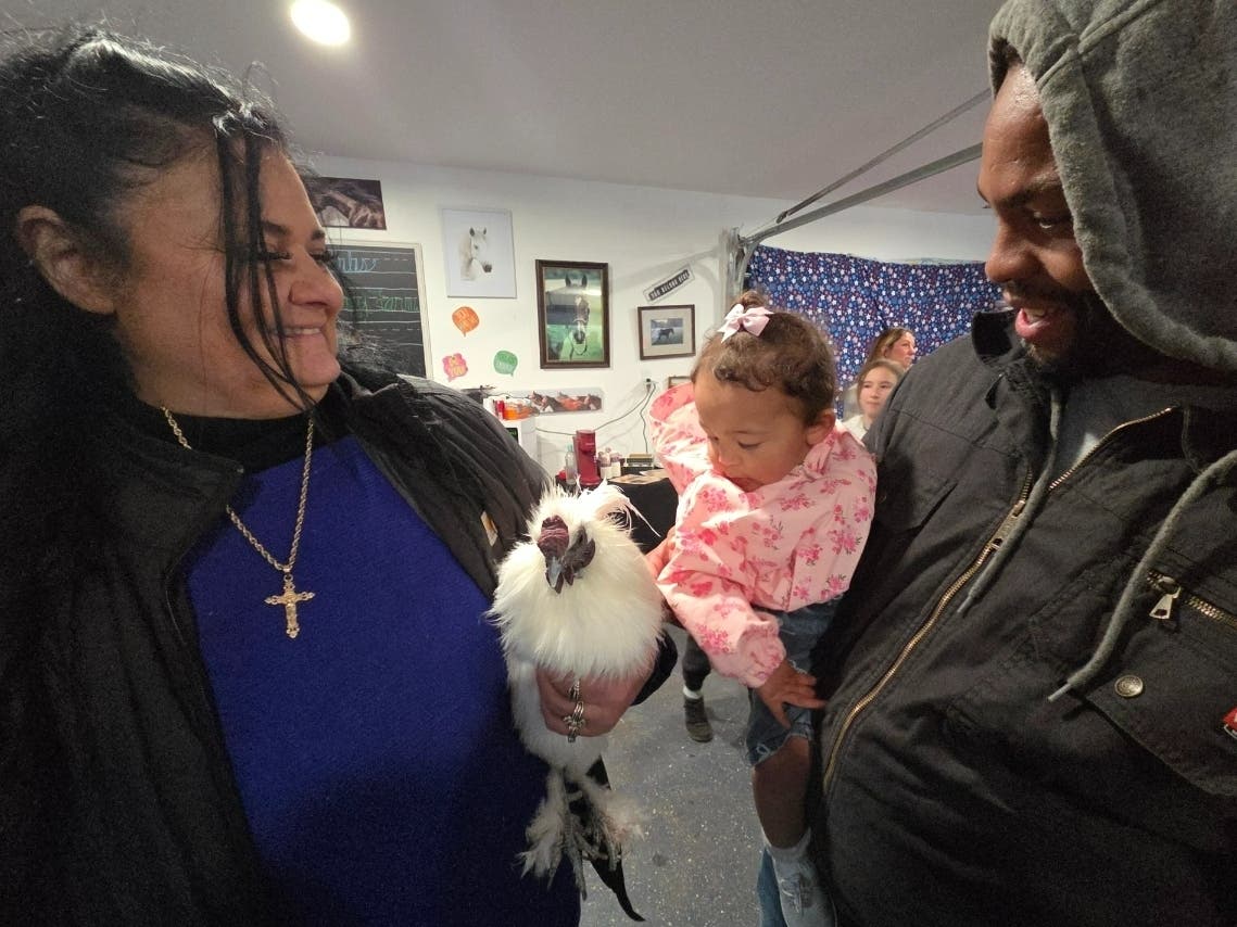 Julia Callano holds Marshmallow, a chicken she rescued from drowning when it was a chick. Marshmallow is a favorite of many children who visit Samrock Stables, home to Angel and Jules' Not-So-Ordinary Farm in Howell.