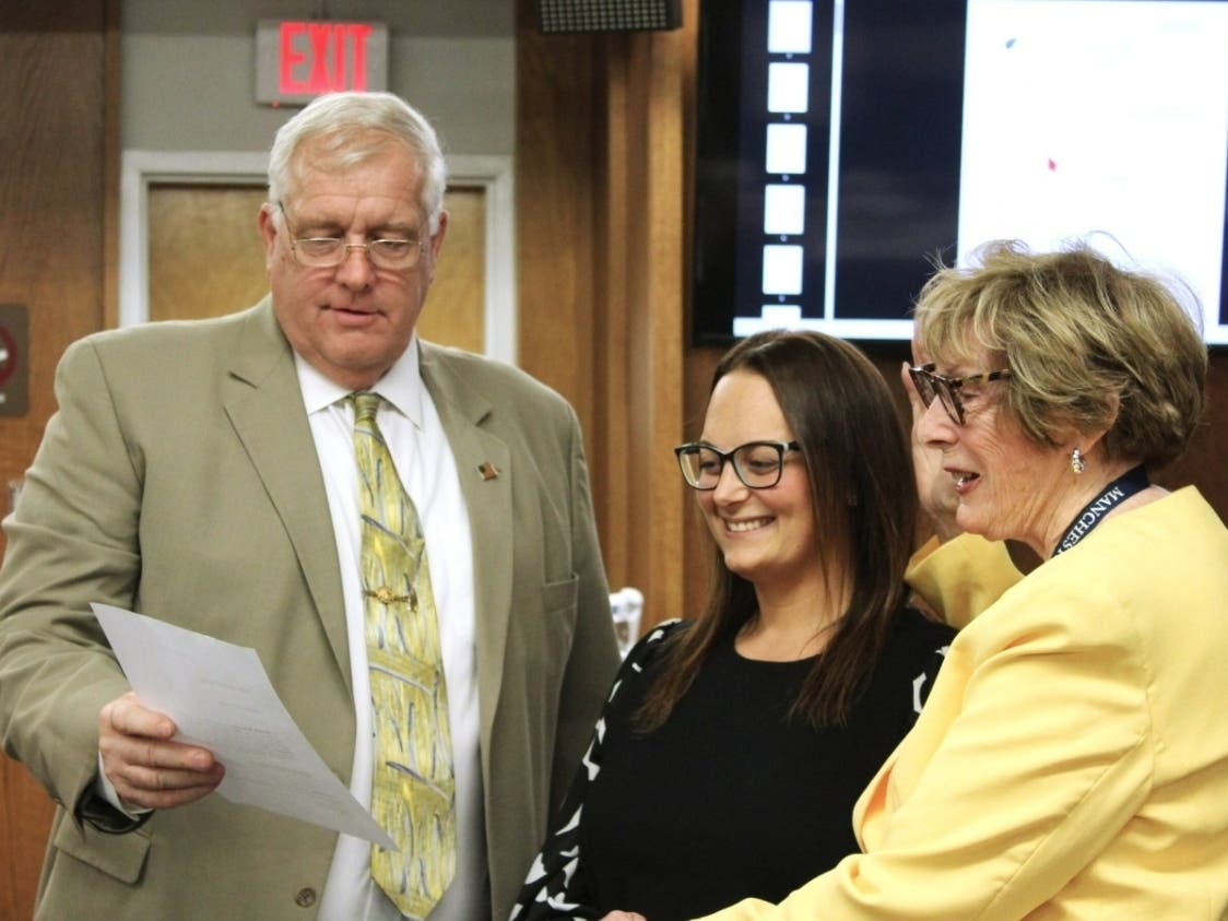 Judith Noonan takes the oath to become a councilwoman in Manchester, filling the unexpired term of Roxanne Conniff, who resigned in April after moving out of Manchester. 