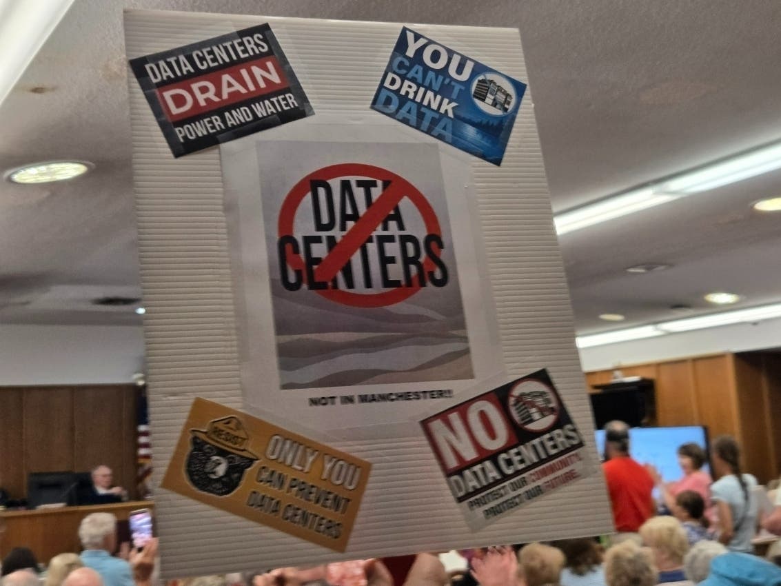 An overflow crowd of residents protested at the Manchester Township Council meeting, demanding the council ban AI data centers in the township.