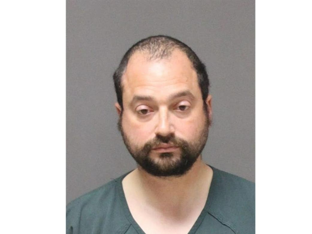 The Lakewood man charged with arson has convictions for driving a school bus on a sidewalk and aggravated assault, court records show.