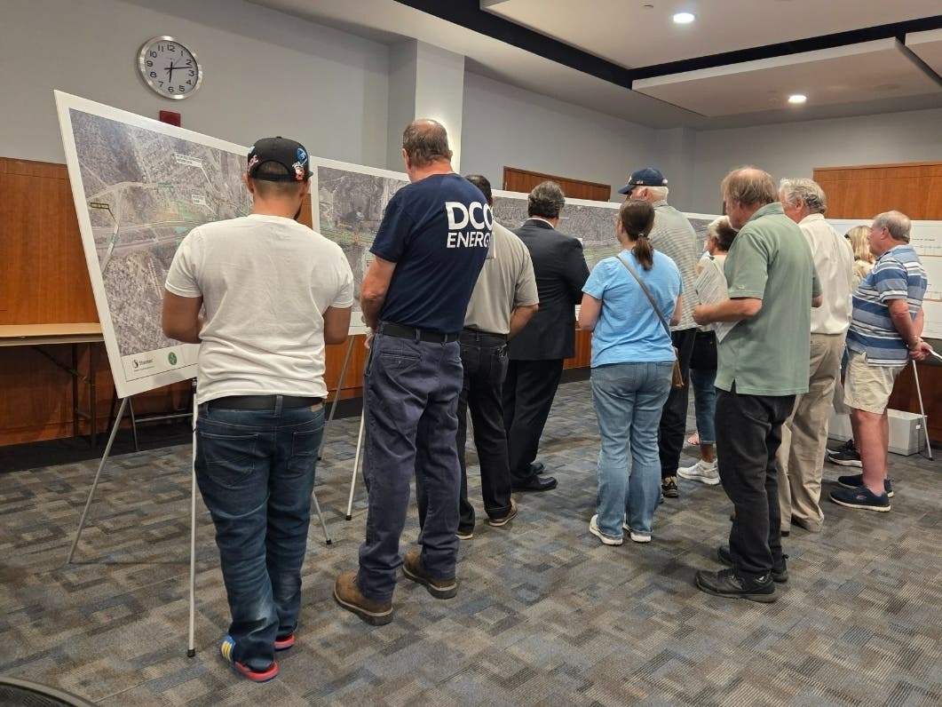 People check out the diagrams of the proposed changes to the Garden State Parkway from Exits 80 to 83 at a public hearing at the Ocean County Library on Wednesday.