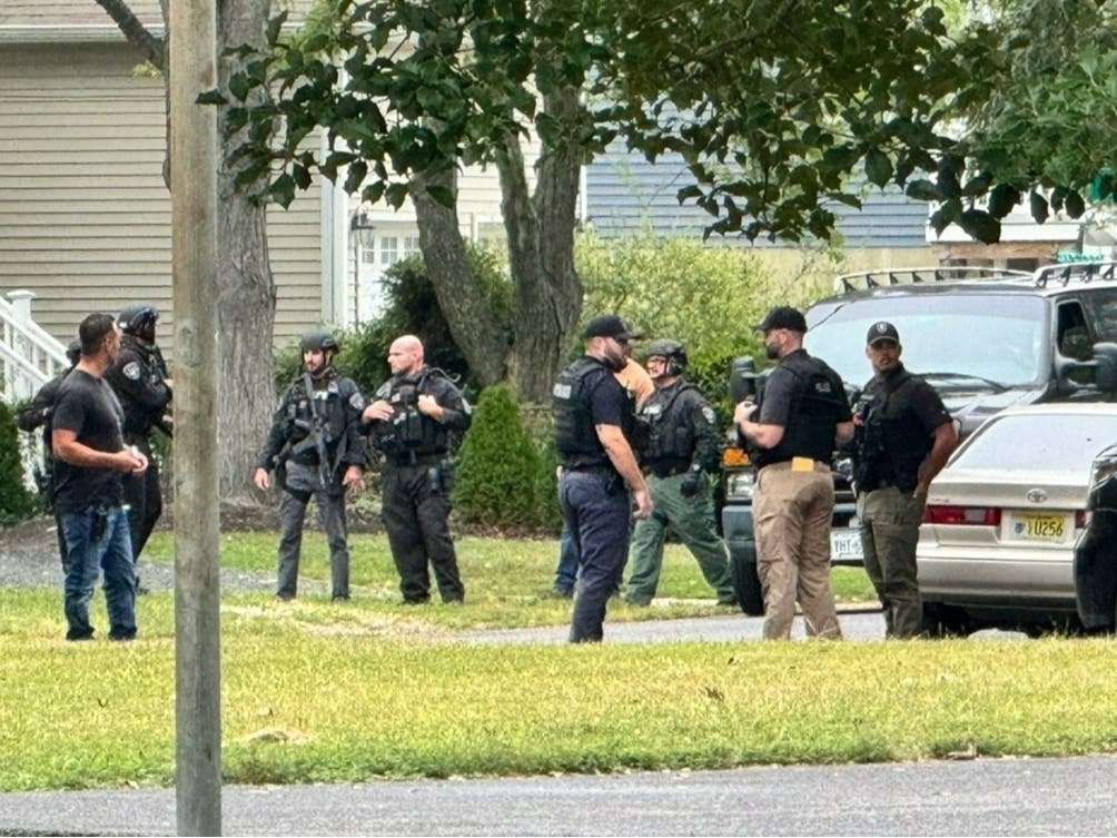 Authorities searched the home of Douglas Cobb in Toms River on Sunday as they continue trying to locate him in the fatal shooting of Bruce Gress, 42.