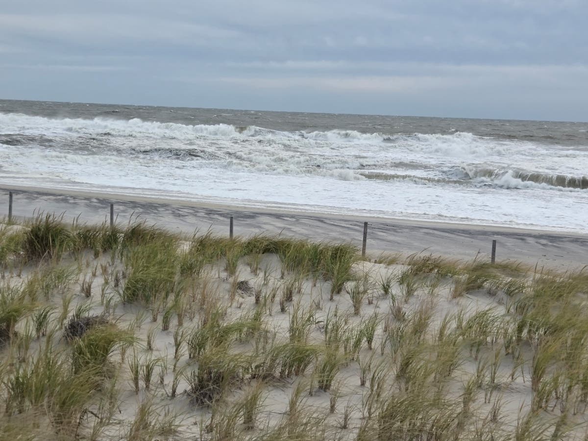 The approaching nor'easter was roiling the waves along the oceanfront at the Jersey Shore on Friday.