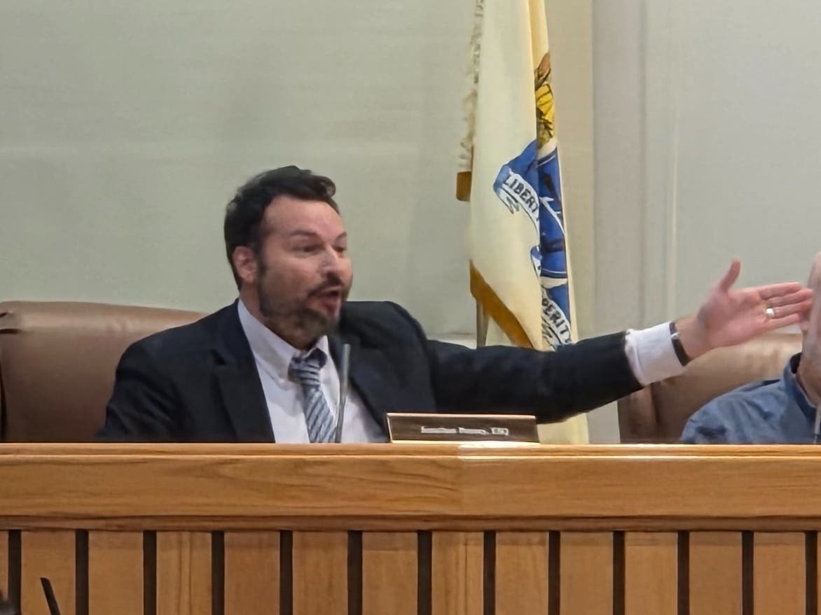 Toms River Township Attorney Jonathan Penney responds to comments from resident Carlos Almanzar. He eventually told Almanzar he was embarrassed that they are both Latinos.