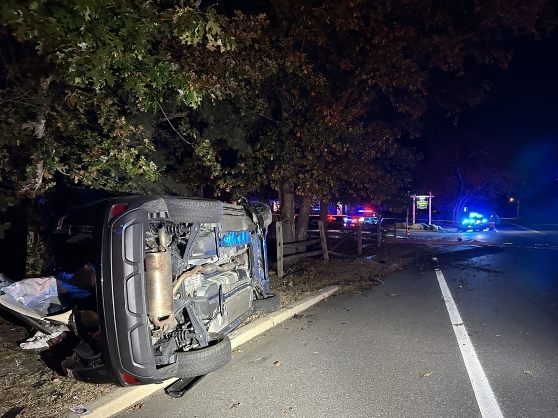 The woman's vehicle ran off the road and hit a utility pole and a fence, Manchester police said. 