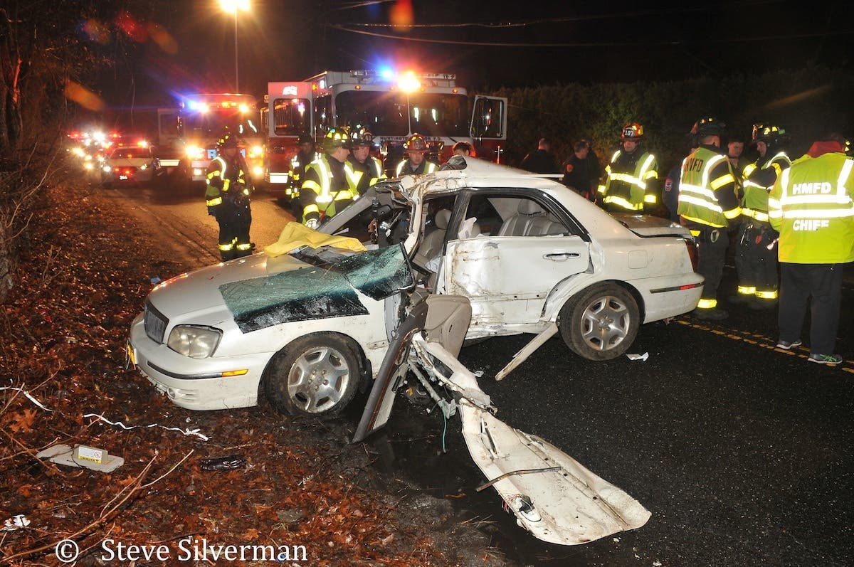 Trapped Driver Rescued After Striking Pole In Huntington Station ...