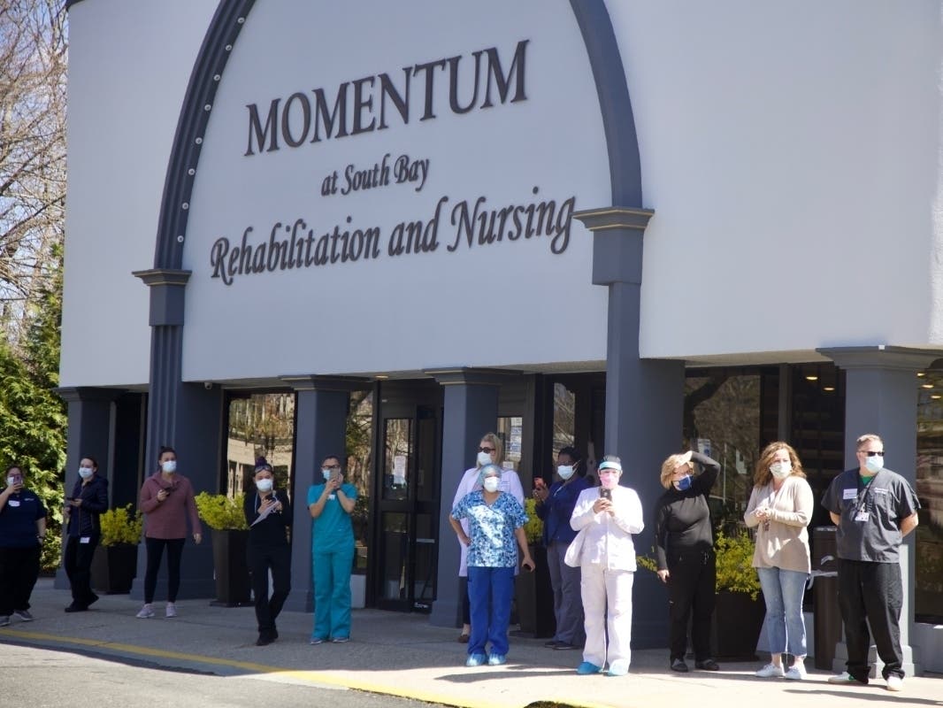 The employees of the Momentum at South Bay Rehabilitation and Nursing facility​ received a special show of support from their local fire department.