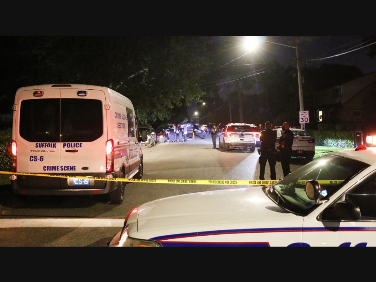 The 26-year-old man was sitting in a parked car on Winter Avenue, near Nicolls Road when he was struck by a bullet fired from outside the car at 10:30 p.m.