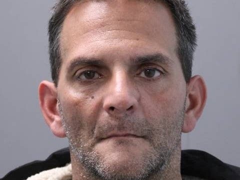 Joseph Mancuso, 48, of Central Islip was charged with first-degree robbery, fourth-degree grand larceny, fourth-degree criminal possession of stolen property and petty larceny, police said. 