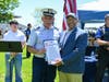 Southold Town Councilman Brian O. Mealy presents a NSBW Proclamation to Robert Martinez, Flotilla Commander of U.S.C.G Auxilary Southold Flotilla which is  in the Eastern Long Island Division. 