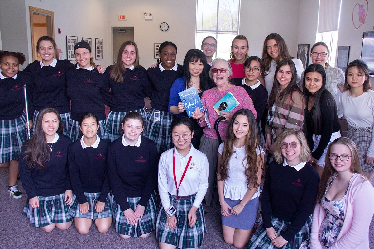 Author Jean Kwok, center, visits Woodlands Academy April 25 as part of Ragdale's A Novel Affair program.  