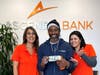 AVP, Branch Manager Danielle Lucas with $100 Instant Cash Winner Erington Grant and Assistant Branch Manager Berty Carroll in Prospect Ave. West Orange branch