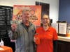 $100 Instant Cash Winner Gerard Wilson with EVP, COO Andriette Mathews in the Hawthorne branch