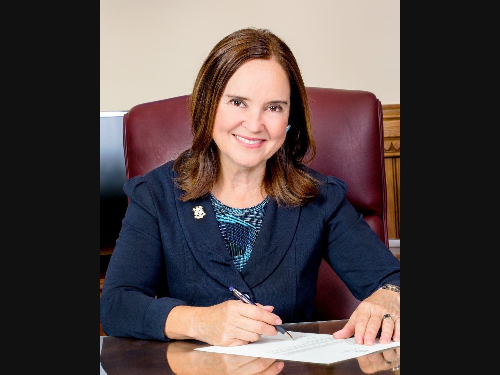 Denise Merrill will resign, effective June 30.
