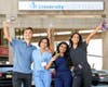 Rutgers New Jersey Medical students — aka the Bergen Barbers — Ivan Loncar, Hetal Lad, Sowntharya Ayyappan and Shivani Srivastava outside University Hospital in Newark. 
