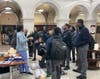 Rutgers New Jersey Medical School student Kulsum Larry (left), trains a group on Hands-Only CPR at the Newark Public Library.