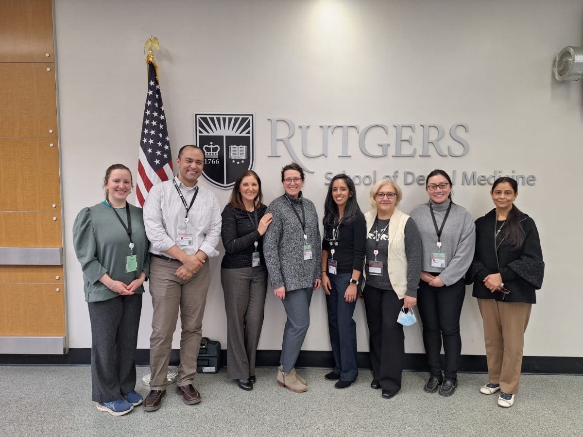 Mohamed Mansour (second from left) and Deanne Confalone (third from left) with the 2025–2026 From Practice to Preceptor Faculty Training Program cohort. 