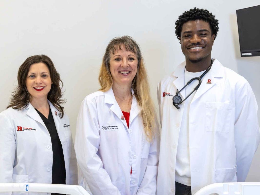 Angela Starkweather (center), dean and professor Rutgers School of Nursing, and students Julie Cornell (left) and Triumphant Aydodele (right).
