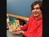 A workshop attendee successfully created a "Gift Wrap Gift Bag" designed to help wrap odd-shaped presents.