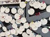 "Kindness," "Helping others," and "Shoveling my Neighbor's driveway," are a few of the notes added to the "What does community mean to You?" interactive art display at the WPL.