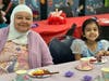 May tea parties have become a library tradition, bringing together generations of family members. Registration is required.
