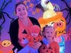A mother, a kindergartener, and a baby visit the Not-so-Scary Haunted House in October. House theme and decor change yearly!
